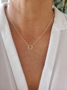 "This fun and versatile set adds a touch of sparkle to any outfit. You can wear them together or separately. The necklaces are completely separate and made in lengths 2 inches apart to stagger them appropriately. Shown in photos in 16\", 18\", 20\" set. Necklaces are all handmade with high quality gold fill or sterling silver materials so they won't tarnish or discolor. You can wear them in the shower, to the beach, gym etc. 3 piece set includes: 1) Tiny Open Circle Necklace 2) Tiny Pave Crystal Elegant Circle Charm Necklaces For Everyday, Elegant Everyday Circular Charm Necklaces, Elegant Open Circle Charm Necklace, Delicate Chain Open Circle Necklace, Minimalist Circle Charm Necklace, Necklaces Layering, Three Necklaces, Beach Gym, Flower Bar