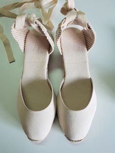 "Lace up, rope sole espadrille PUMP wedges (5cm heels = 1.97 inches) in IVORY with reinforcement stitching in the front. Antislippery soles covered with rubber. In order to prevent the fraying of the ribbons, the ribbon ends are glued, what makes a quite nice closing (see last pic for details). The comfiest wedge for walking! 👣 🦋 VEGAN SHOES, animal friendly & sustainable. Eco friendly. Jute fiber has excellent insulating properties and low thermal conductivity. It is environmentally frien Beige Closed Toe Espadrilles With Woven Sole, Cream Closed Toe Espadrilles With Woven Sole, Beige Lace-up Espadrilles With Woven Sole, Cream Closed Toe Espadrilles With Rubber Sole, Cream Espadrilles With Rubber Sole And Flat Heel, Cream Espadrilles With Rubber Sole For Summer, Cream Round Toe Canvas Espadrilles, Cream Canvas Espadrilles With Round Toe, Beige Closed Toe Canvas Espadrilles