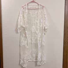 Medium Off-White Sheer Lace Cardigan Cover-Up Great Condition. Never Worn. Originally Purchased On Amazon Lace Cover Up, Elegant White Open Front Cardigan, White Long Elegant Cardigan, White Fall Cardigan For Vacation, Elegant Long White Cardigan, White Spring Outerwear For Vacation, White Spring Vacation Outerwear, White Long Cardigan For The Beach, Long White Cardigan For The Beach