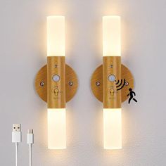 two wooden wall lights are on the wall