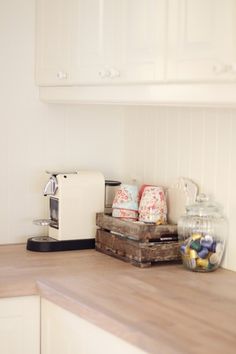 the kitchen counter is clean and ready to be used for breakfast or desserts,