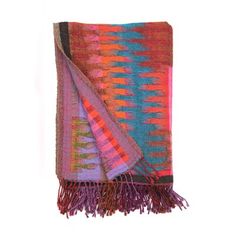 a multicolored blanket with fringes on it