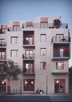 an apartment building with many balconies and windows