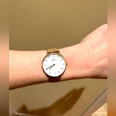 This Is The Daniel Wellington Watch With A White Face And Rose Gold Hardware. The Style Is Called Petite Melrose. Comes In Original Box, Brand New, Never Worn. Still Has The Glass Protector On It (Which Is Why A Red Line Shows On Face)And Protective Sticker On Back Of The Watch As Well. Bought At Bloomingdale’s A Few Years Ago And I Never Wore It Because Rose Gold Does Not Look Good On Me. Buy With Confidence I Ship Same Or Next Business Day And I’m A Five Star Seller On Poshmark! Classic White Watch For Everyday Use, Classic Round Everyday Watch Accessories, Classic Everyday Round Watch Accessories, Luxury White Watch For Everyday Wear, Classic White Watch For Everyday Wear, Classic White Watch For Everyday, Classic White Watch Accessories For Everyday, Classic White Watch Accessories For Everyday Use, Luxury White Watches For Everyday