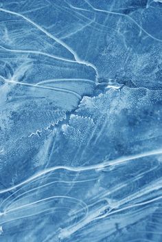 an aerial view of snow and ice on the ground, with lines drawn in it