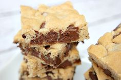 chocolate chip cookie bars stacked on top of each other