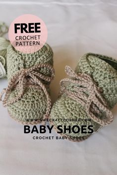 two crocheted baby shoes sitting on top of a white sheet with the text free crochet pattern