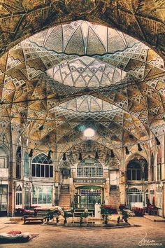 the inside of an old train station with many windows