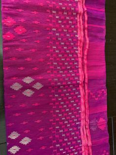 "Exclusive Pure Handwoven Handloom Authentic Original Jamdani Saree from Dhaka, Bangladesh. This Jamdani has been crafted with Zari and Thread of mixed of 60/80   counts. \"Jamdani (Bengali: জামদানি) is a fine muslin textile produced for centuries in South Rupshi of Narayanganj district in Bangladesh. \" Product Description: Saree Type :Jamdani Thread Count: 60/80 count Blouse Piece : YES Fall & Pico: Done Saree Fabric : Half Silk Extremely Light Weight Color : As shown in the photo Disclaimer: slightly color variations may be possible due to light effects!." Traditional Pink Handloom Blouse Piece, Semi-stitched Pink Handloom Saree, Handloom Pre-draped Saree For Puja And Eid, Handloom Pre-draped Saree For Eid Puja, Bollywood Style Blouse With Traditional Weaving, Pink Handloom Traditional Wear For Ceremonies, Pink Unstitched Handloom Saree, Pink Chanderi Handloom Salwar Kameez, Pink Weaving Work Dupatta For Festive Occasions