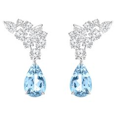 Inspired by the JOY of experiencing a gushing waterfall, these stunning earrings from the Cascade Collection feature mixed rose cut colorless diamonds and drops of aquamarine. These dressy earrings are perfect for the festive season! Wear these with a sparkly sequin dress. Accompanied with a total of 5 1/3 Carat gemstones, these earrings will be delivered in a HARAKH jewelry box along with a HARAKH authentication certificate and a reflection card. Drawing from a century of expertise in the diamond and jewelry industry, HARAKH was launched in 2017, to introduce the finest gemstones and the most exceptional craftsmanship for discerning jewelry collectors globally. All our precious stones are responsibly sourced and less than 0.5% of the world's gemstones will make the HARAKH grade and standa Luxury Light Blue Fine Jewelry Earrings, Sparkly Sequin Dress, Lux Jewelry, Dressy Earrings, Diamond Chandelier Earrings, Luxe Jewelry, Aquamarine Earrings, Card Drawing, Colorless Diamond