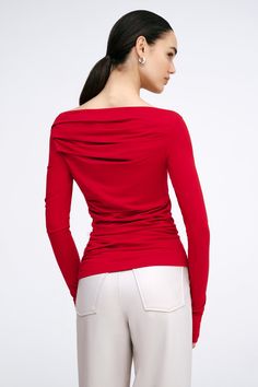 When you want to feel dressed up but not overdone, reach for our Cooper Top. In soft, high-stretch and eco-friendly European jersey, she offers soft folds and gathered sides that create a unique draped look on both front and back. Her wide boat neckline can be worn on- or off-shoulder, allowing you to switch her up for day or night. Cuffs and thumbholes provide additional visual interest. | Mily, in red, is 5'10" (178 cm) tall, wearing size XS. Sam, in red, in orchid pink, in slate grey, and in Fall Red Elastane Tops, Red Elastane Party Top, Red Elastane Tops For Spring, Chic Red Fitted Top, Red Party Top, Early Black Friday, Top Clothing, Slate Grey, Boat Neckline