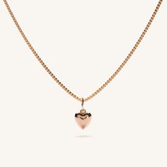 The Puffy Heart Necklace was made to be worn just above the heart, and hangs on a chain perfect for layering with a statement pendant. Add a touch of love and romance to your stack with this piece. 14k Gold Fill Length: 16" + 2" Extender Dimensions: 8 mm Make your jewelry last! Click here for jewelry care. Need a gift box? We got you. Puffy Heart Necklace, Holiday Promotions, Puffy Heart, Jewelry Studio, Statement Pendant, Egift Card, Heart Necklace, Jewelry Care, Gold Filled