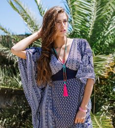 This Caftan style dress is the perfect, elegant wear that you can take to the beach or to wedding , depending on your accessories. This dress will make you feel like a Goddess ! Its shape enhances all body shapes with a gorgeous long lean figure. It is the perfect Resort , Holiday wear and is also very practical for your vacations. Its light weight fabric never wrinkles and it does not need and ironing ! Never ! its a total blessing ! Straight out of the washing machine ready to wear ! It has la Patterned Dresses With Kimono Sleeves For Summer, V-neck Dresses For Vacation Festivals, Printed Tunic Maxi Dress For Festivals, Summer Dresses With Printed Kimono Sleeves, Festival Tunic Maxi Dress Printed, Hippie Beach Cover-up Dress With Kimono Sleeves, Blue Printed Hippie Dresses, Traditional V-neck Dress For Beach Season, Blue Hippie Printed Dresses