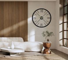 a living room filled with furniture and a large clock on the wall above it's face