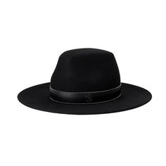 Refine your style with our black felt fedora hat, complemented by an elegant leather-effect belt for a timeless touch.

 	- Black felt fedora
 	- Leather effect belt
 	- Silver details
 	- Maison Michel logo

Size advice: this product fits normally, we advise you take your usual size. You don't know your size? Click here.


How to care for your hat:
The handcrafted design of this model does not allow it to be waterproof. It is recommended to store it away from air and humidity. Luxury Black Leather Felt Hat, Winter Lookbook, Felt Fedora, Black Felt, Head Accessories, Felt Hat, Turbans, Earmuffs, Fedora Hat