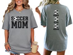 Celebrate your favorite soccer players with our custom soccer mom shirt, personalized with the players names and numbers on back. With short sleeves and a classic crewneck, this shirt makes the perfect gift for the soccer mom or mama who loves to show her support on game day at the soccer fields, making her feel like a varsity soccer super fan. COMFORT COLORS 1717 SHIRT: Unisex 100% US cotton - ethically grown and harvested Pre-Shrunk Fabric Relaxed Fit - Size up for a trendy oversized look Seam Personalized Sporty T-shirt For Sports, Sporty Personalized T-shirt For Sports, Personalized Short Sleeve Tops For Sports Events, Sporty Personalized T-shirt For Sports Events, Personalized Crew Neck T-shirt For Fans, Sporty Personalized Short Sleeve Top, Personalized Fan Merchandise Crew Neck T-shirt, Personalized Crew Neck T-shirt For Game Day, Personalized Crew Neck Sports Top