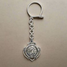 With this traditional Greek Macedonian Alexander the Great Motif you will never be lost. Handmade key ring in sterling silver. Sterling Silver Key Ring 100% the brightest of all precious metals Special secure design for the clasp so that your keys remain at all times at their place Greek key ring with fabulous detailing to the front and back  Handcrafted key ring. Forget the standardized products on the market! Stand out with our individually handmade ELEFTHERIOU EL key rings Made in Greece Alex Silver Keychain With Key Clip As Gift, Silver Keychain With Key Clip For Gift, Silver Keychain With Lobster Clasp As Gift, Silver Keychain With Lobster Clasp For Gift, Silver Metal Keychain As Gift, Silver Metal Keychains As Gifts, Silver Metal Keychain For Gift, Silver Key, Alexander The Great