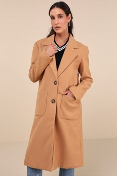 The Lulus Style Squad Tan Long Coat is here to protect your outfit from the elements while you and your besties hit the town! Thick, woven wool-like felt forms this chic, structured coat with a collared neckline, wide lapels, long sleeves, and long, two button bodice with front patch pockets. Fit: This garment fits true to size. Length: Knee Length. Size medium measures 44" from shoulder to hem. Bust: Great for any cup size. Waist: Not Fitted - comfortable room throughout midsection. Hip: Not Fitted - room for hips. Fabric: Fabric has no stretch. Fully lined. Shell: 70% Polyester, 30% Wool. Lining: 100% Polyester. Hand Wash Cold. Do Not Bleach. Line Dry. Iron Low Heat. Imported. Lulus | Style Squad Tan Long Coat | Size Medium | 100% Polyester. Tan Long Coat, Felt Coat, Comfortable Room, Cup Size, Long Coat, Knee Length, Bodice, Bleach, Hand Wash