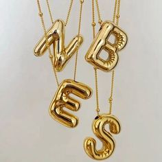 ------ 2023 New Trendy Gold Plated 3D Balloon Alphabet Initial Letter Pendant Necklace Custom Personalized Name Choker Gift  1.Name Necklace       2.Necklace Size: Chain Length: Approx. 45cm, Adjustable       3.Condition:1mm=0.0393inch or 1inch=25.4mm 4.Material Metal Copper 5.ColorAs shown in figure (Gold Color) 6.Unit Quantity10pcs/LOT   7. Product Condition>> :New If you any questions regarding our products, bulk discount, and issue please send us a message Our Storefront Page is https://www. Bubble Letter Necklace, Personalised Jewellery Necklaces, Gold Bubbles, Bubble Letter, Gold Letter Necklace, Letter Pendant Necklace, Initial Pendant Necklace, Jewelry Lookbook, Gold Necklaces