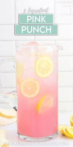 a pitcher full of pink punch with lemons on the side and text overlay