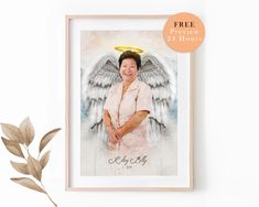 an angel with wings is on the wall next to a plant and a framed photo