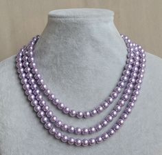 I make the necklace to use 8 mm lilac glass pearls.The necklace length is select .IT is good necklace for your great wedding. I can make different type necklace to your requirements,Please feel free to contact me if you have any question. Thank you so much. . matching earrings: https://www.etsy.com/shop/glasspearlstore/search?search_query=lilac+earring&order=date_desc&view_type=list&ref=shop_search mathing bracelet: https://www.etsy.com/shop/glasspearlstore/search?search_query=lilac+ Pale Purple Necklace, Cheap Beaded Lavender Necklaces, Elegant Lavender Pearl Necklace With Round Beads, Elegant Purple Beaded Necklace For Wedding, Good Necklace, Lilac Earrings, Pearl Necklace Wedding, Pearl Design, Necklace Wedding