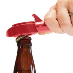 a bottle opener being used to open a beer bottle in order to make it pop