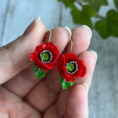 ♥ Handmade with love especiale for you ♥ Unique and one-of-a-kind, each one is different ♥ realistically natural looking Made in Ukraine❤️ Elegant simplicity❤️ Exclusive handmade flower jewellery set with saturated red poppies❤️  *Size - the ring has an adjustable band. * diameter of the poppy is about 1.5 cm (0.59 inches) * can be matte (without lacquer) or glossy (lacquered) * Please choose the best earring clasp type *LOOK FOR SIMILAR ITEMS?  Please follow this link: www.etsy.com/shop/OrxideykaStudio?ref=l2-shop-header-avatar&search_query=poppies *Some details -if you'd like to get jewellery in another colour, we'll be a pleasure to create it for you. Please consider that real colours may slightly differ from one monitor to another, as it depends on specific monitor settings. -these jew Flower Shaped Polymer Clay Earrings For Gift, Red Hand Painted Earrings For Gift, Hypoallergenic Flower-shaped Polymer Clay Jewelry, Red Flower Earrings For Mother's Day Gift, Handmade Red Earrings For Mother's Day, Hand-painted Red Jewelry For Valentine's Day, Hand Painted Red Jewelry For Valentine's Day, Handmade Flower Polymer Clay Earrings For Gifts, Red Polymer Clay Flower Earrings For Gift