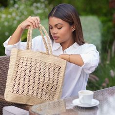 Salama is a large tote bag  offering a spacious interior to hold essentials like sunscreen, towels, water bottles, or just your everyday accessories!   Because each bag is handmade, no two bags are exactly alike, making yours a truly one-of-a-kind accessory. The subtle variations in weaving patterns and color tones add to the bag's unique charm, celebrating the individuality and artistry of the women artisans who crafted it.  Purchasing this bag not only adds a stylish and functional accessory t Rectangular Natural Beach Bag With Large Capacity, Natural Rectangular Beach Bag With Large Capacity, Large Capacity Rectangular Beach Bag In Natural Color, Summer Natural Color Tote Box Bag, Natural Color Summer Tote Box Bag, Large Capacity Natural Rectangular Beach Bag, Natural Large Capacity Bucket Bag For Shopping, Square Natural Beach Bag For Daily Use, Natural Square Beach Bag For Daily Use