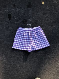 Purple Plaid Shorts. Great to wear for your next festival. Super cute summer shorts. Super cute and really comfy shorts. Made from cotton shirting with an elastic waist band. Great gift for a birthday, holiday or even a treat for yourself. All of my shorts are made to order so if you have a special request you can leave me a note with your order telling me your exact size specifications. If you don't see your size, if you need the shorts bigger or smaller just tell me and I can make it whatever Cute Summer Shorts, Gingham Shorts, Festival Shorts, Black And White Shorts, Purple Plaid, Lightweight Shorts, Shorts Summer, Trendy Shorts, Comfy Shorts