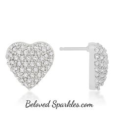 Kendal Pave Heart 0.7ct Cubic Zirconia Romantic Stud Earrings Heart design with paved clear cubic zirconia stud earring on slvertone rhodium plated finish. This beautiful set of pave heart earrings will glisten to perfection. Item: BSJG-E150164RC01 Plating Color: Silvertone Rhodium Base Metal: Lead Free Alloy (Brass) Gemstone Grade: AAAAA Cubic Zirconia Gemstone Color: Clear Total Carat Weight: 0.7ct ea Stone Cut: Round Stone Size: 1.3mm Adornment Size: 10mm L x 10mm W Face Height: 4mm H Setting Heart Shape Earrings, The Crown Jewels, Cubic Zirconia Jewelry, Heart Shaped Earrings, Heart Stud Earrings, Cz Stud Earrings, Silver Engagement Rings, Jewelry Pins, Crown Jewels