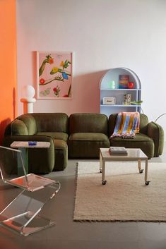 a living room filled with furniture and a book shelf