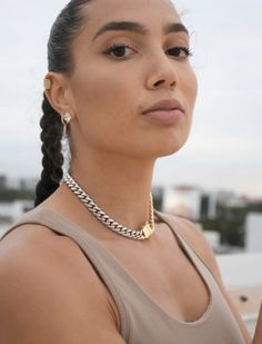 This is a one-of-a-kind curb choker that is so unique you have to buy it just to have it! One side of this choker is white gold, and the other is 18k gold filled with a beautiful gold box clasp to secure the piece nicely!  Model is wearing Choker Style 14.5"  Measurements/Specs:  - 14.5" Thick Link Choker  - 17" Thick Link Chain  - 11mm Thick  - Color is split right down the middle  - Bracelet is 9" long 🌼Check out the matching Bracelet Here: https://bit.ly/Cubanbracelets This piece looks beautiful alone or mixed and matched! 🌺 Care Instructions:  -We always recommend anything that is not solid gold to avoid liquids, perfumes and lotions. Don't worry our beautiful pieces will hold up to the elements of daily life,  but remember they are NOT SOLID GOLD!  -We want our products to work for Cuban Choker, Cuban Necklace, Miami Cuban, Half And Half, Gold Box, Box Clasp, Choker Style, Trendy Necklaces, Matching Bracelet