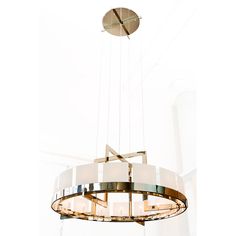 a modern chandelier hanging from the ceiling