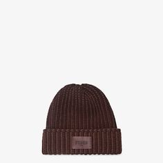 Beanie with turned-up brim. Made in a two-tone, dark purple wool jersey distinguished by a ribbed motif that recalls the iconic Selleria stitching. Embellished with a tone-on-tone Fendi Roma label in leather. Made in Italy. Size M_l Luxury Brown Hat For Fall, Classic Burgundy Hats For Fall, Classic Burgundy Hats For Winter, Classic Burgundy Winter Hat, Luxury Fitted Brown Hat, Fitted Knitted Hat For Fall, Fitted Knitted Fall Hats, Classic Knitted Hats, Ribbed Fitted Hats For Fall