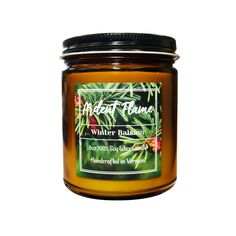 a jar of wild raspberry scented candle on a white background with the label