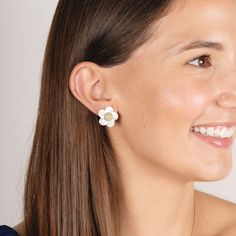 Mila is a stunning new addition to our much loved mother of pearl earring collection Pierced. .80" diameter 14K Gold plated sterling silver. Mother of pearl. Pave cubic zirconium center. White Mother Of Pearl Flower-shaped Earrings, Feminine White Hypoallergenic Earrings, White Mother Of Pearl Flower Earrings, Feminine White Pearl Earrings For Anniversary, Pearl Flower Earrings, Mother Of Pearl Earrings, Earring Collection, Pearl Earring, Pearl Flower