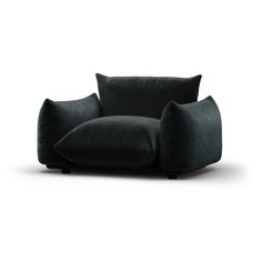 a black couch sitting on top of a white floor next to a pillow covered chair