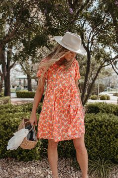 Cute Tiered Dress For Spring Garden Party, Cute Spring Tiered Dress For Garden Party, Cute Spring Tiered Dress, Spring Vacation Tiered Dress With Square Neck, Casual Floral Tiered Dress For Garden Party, Casual Floral Tiered Skirt Dress For Garden Party, Casual Orange Puff Sleeve Dress, Summer Orange Square Neck Dress, Orange Square Neck Summer Dress