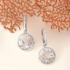 Ross-Simons - Sterling Silver Sea Life Drop Earrings. Capture the beauty of the sea with our sterling silver drop earrings, featuring a myriad of seaside creatures in an open circle design. Textured and polished finishes. Hanging length is 1 1/2". Leverback, sterling silver sea life drop earrings. Silver Ocean-inspired Earrings, Nickel-free Silver Ocean-inspired Earrings, Ocean-inspired Silver Jewelry With Matching Earrings, Ocean-inspired Sterling Silver Jewelry, Silver Hoop Jewelry For Beach, Silver Hoop Jewelry For The Beach, Sterling Silver Ocean-inspired Earrings With Ear Wire, Ocean-inspired Sterling Silver Drop Earrings, Ocean-inspired Sterling Silver Jewelry With Ear Wire