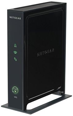 the netgear router is black and has green buttons