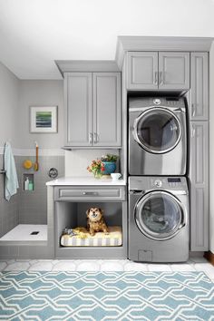 an appliance is shown in the kitchen with grey cabinets and white counter tops