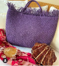 Fringe raffia bag handmade of paper raffia yarn (natural cellulose) in reach purple / lilac color. It can keep a lot of little things that no woman can do without.  This tote bag can be used like beach bag, market shopping bag, daily and holiday bag. High quality great handmade gift for any occasion and for women any age. more crochet bag here https://etsy.me/3mXZ93a Size: 12`` length x 18`` height (30x45 cm) Small pocket inside, no lining Crochet bag is smooth, strong, soft, breathable, hypo-allergenic, does not gather dust or dirt - lightweight, does not wrinkle, easy to wash Paper raffia yarn is tolerate well humid conditions and, due to the tight crochet, it does not ignite easily. CARE: hand washable in cold water 30 C. Dry flat. Special designs can be created by combining different c Crochet Lilac, Purple Beach, Crochet Beach Bags, Purple Crochet, Summer Tote Bags, Crochet Market Bag, Holiday Bag, Boho Purses, String Bag