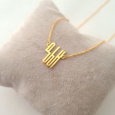 This necklace is a piece of our new collection of Allah necklace made from sterling silver and 14k gold. The collection includes different designs that suit all tastes Kufi/calligraphy, heart/rectangle/triangle shapes, tiny/big sizes. Here is the link for the full collection: https://etsy.me/2Swd0lPAll the designs can be made as necklace, bracelet, and earrings. If you also want a complete set that includes a necklace, a bracelet and earrings please get in touch with us. We accept custom orders! Minimalist Gold Name Necklace As Gift For Mom, Gold Custom Necklace With Initials For Gift, Gold Initials Custom Necklace As Gift, Elegant Initial Pendant Name Necklace For Mom, Gold Monogram Necklace For Mother's Day, Elegant Initial Pendant Name Necklace As Gift For Mom, Gold Initials Custom Necklace Gift, Gold Plated Initials Name Necklace For Gift, Initials Gold Plated Name Necklace As Gift