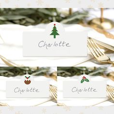 three place cards with christmas trees on them