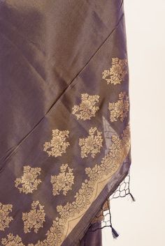 Discover the elegance of our Gray Shimmer Tissue Saree featuring exquisite Matt Gold Floral Handwoven Work. Hand embroidered to perfection for a timeless look. Formal Unstitched Saree With Intricate Embroidery, Formal Silk Saree With Embroidery, Elegant Silk Shawl With Chikankari Embroidery, Formal Saree With Intricate Embroidery, Traditional Formal Saree With Chikankari Embroidery, Formal Embroidered Tissue Silk Saree, Elegant Shawl With Zari Work For Formal Occasions, Elegant Formal Saree With Chikankari Embroidery, Elegant Formal Shawl With Zari Work