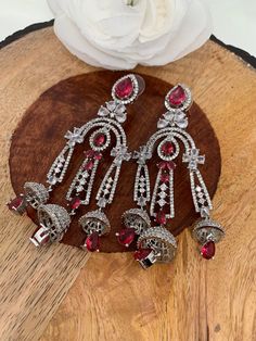 AD Wine Red Chandelier Silver Polish Earrings Formal Red Chandelier Earrings, Red Chandelier Earrings For Formal Events, Red Dangle Bridal Earrings, Red Ruby Dangle Chandelier Earrings, Red Chandelier Earrings For Party, Red Chandelier Drop Earrings For Wedding, Ruby Chandelier Drop Earrings For Party, Red Crystal Dangle Chandelier Earrings, Red Crystal Chandelier Dangle Earrings