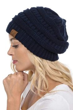 Out ultra-comfy CC hats come in a variety of colors. Style: Knit Beanie Material: 100% Acrylic Size: One Size Fits Most Measurements: 22-3/8" (57 cm.), Size 7-1/8 | Flat measurements: 11" x 9" An oversized slouchy cable knit beanie with ridges and a cuffed detail. Available in an array of solid colors. Black hat does NOT come with pom pom Comfortable Slouchy Winter Hat, Cozy Adjustable Super Soft Hats, Warm Hats For Cold Weather, Warm Comfortable Hats For Cold Weather, Adjustable Cozy Hats, Comfortable Warm Hats For Cold Weather, Cozy Adjustable Hats, Cozy Adjustable Crochet Hat In Soft Knit, Cozy Adjustable One Size Hats