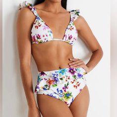 Patbo Blossom Ruffle Bikini Set Nwt Size M You Can Buy Yourself Flowers! Top: Designed With Flutter Straps, This Triangle Bikini Top Features A Bright Floral Print. Triangle Cups Flutter Straps Self-Tie Back Straps Lined Polyamide/Elastane Hand Wash Imported Bottoms: High Waist Bikini Bottom With Structured Ruffles Along The Front. Bloom Ruffle Bikini Bottom Is A High Waist Fit Sits Just At Or Above The Navel With Medium To Full Rear Coverage. Feminine Ruffled Swimwear For Vacation, Chic White Swimwear With Ruffles, White Ruffled Swimwear For Beach Party, White Ruffled Swimwear For Spring, White Triangle Top Swimwear With Ruffles, White Ruffled Triangle Top Swimwear, White Feminine Swimwear For Summer, Feminine Floral Print Swimwear For Poolside, Feminine Floral Print Swimwear For Pool