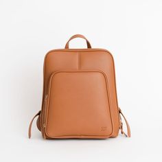 The Olivia Backpack is the most sleek and stylish backpack we've made! Conveniently made to store all the necessary things, including any 13" laptop.  Plenty of pockets to hold and store all the essentials (phone, Chapstick, wallet, hand sanitizer, etc.). Use it for work, school, travel, and everything else in-between. Functional Leather Backpack With Cell Phone Pocket For Everyday, Everyday Softback Backpack With Cell Phone Pocket, Versatile Leather Backpack With Cell Phone Pocket For Everyday, Versatile Leather Backpack With Cell Phone Pocket, Brown Backpack With Cell Phone Pocket For On-the-go, Modern Leather Backpack For Travel With Cell Phone Pocket, Versatile Daily Backpack With Cell Phone Pocket, Versatile Brown Backpack With Cell Phone Pocket, Modern Leather Backpack With Cell Phone Pocket For Travel